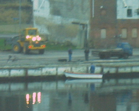 Workers on the waterfront of Alsund